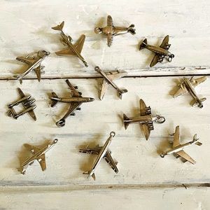 Lot of 12 vintage sterling silver planes